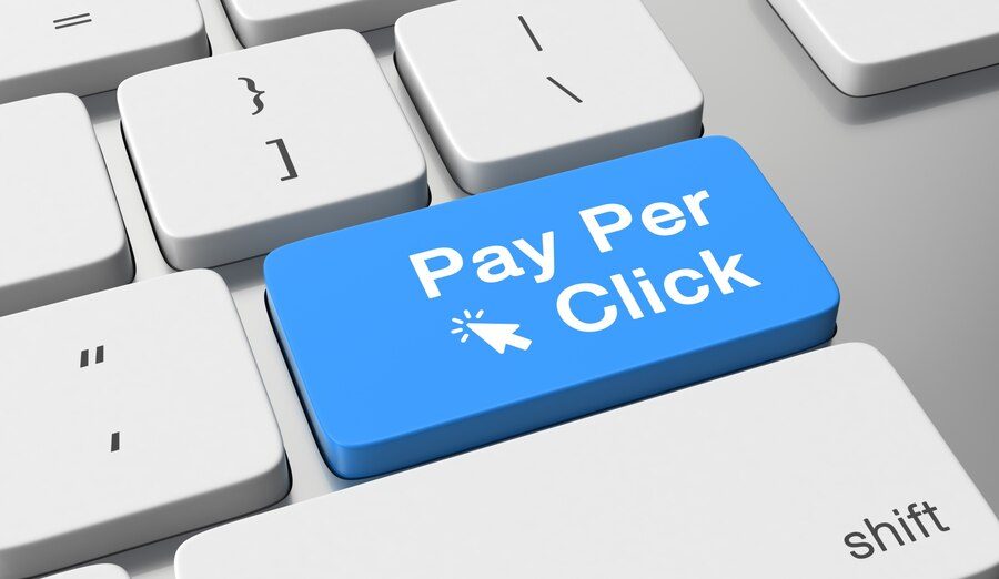 Blue key with the text 'Pay Per Click' representing the concept of PPC campaigns.