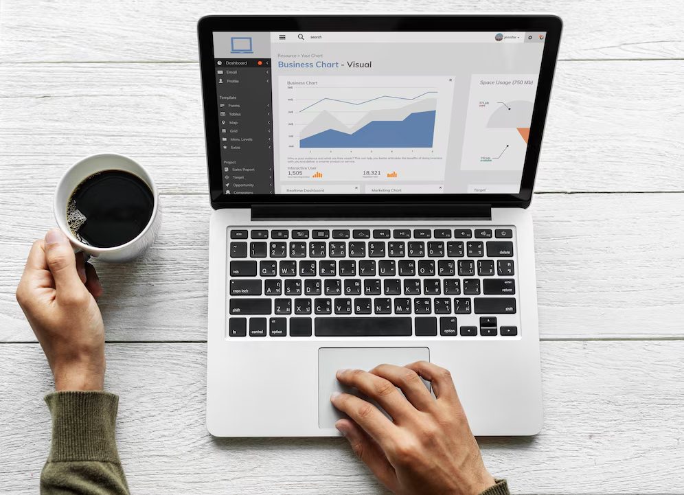 Person working on a computer to manage Google Ads and PPC campaigns for their e-commerce website jewerly store