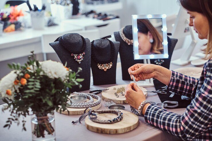 Woman organizing her jewelry store to create content for maximum SEO visibility on her e-commerce website