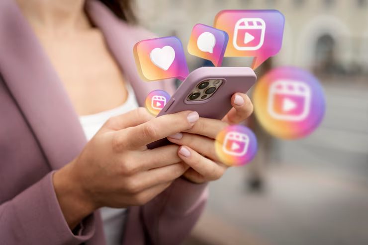A woman holding a phone showing Instagram reactions using the Instagram music feature, symbolizing staying competitive on the platform