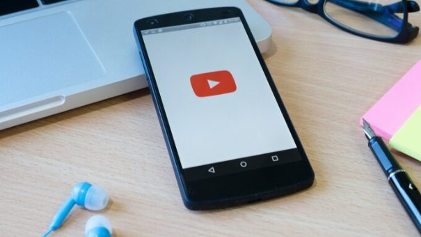 A smartphone displaying the YouTube app, highlighting YouTube Shorts as a potential platform for short-form video content.