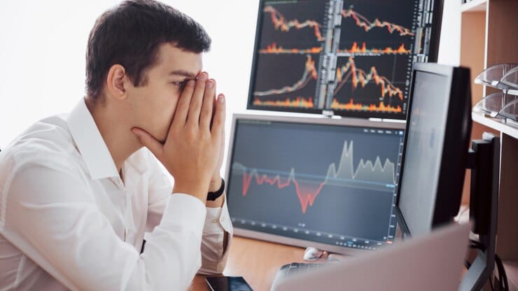 Frustrated advertiser analyzing Google Ads performance due to low conversions.