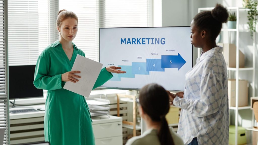 A marketing professional presenting customer insights and segmentation strategies to improve marketing performance and data-driven campaigns.