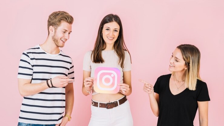 Group of small business owners planning Instagram strategy for 2025 with Instagram logo