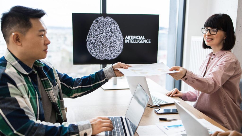 Team collaborating on AI-powered content strategies, showing modern tech in content and SEO services.