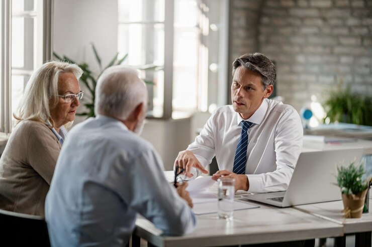 Senior Couple Consulting with Miami Personal Injury Attorney about Recent Accident