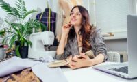 young-creative-brunette-woman-in-a-cozy-studio-startup-of-small-tailoring-business-q25s0jdpfrmfh1sgysw5hsdd7q2qq7rn3zyo59qkds